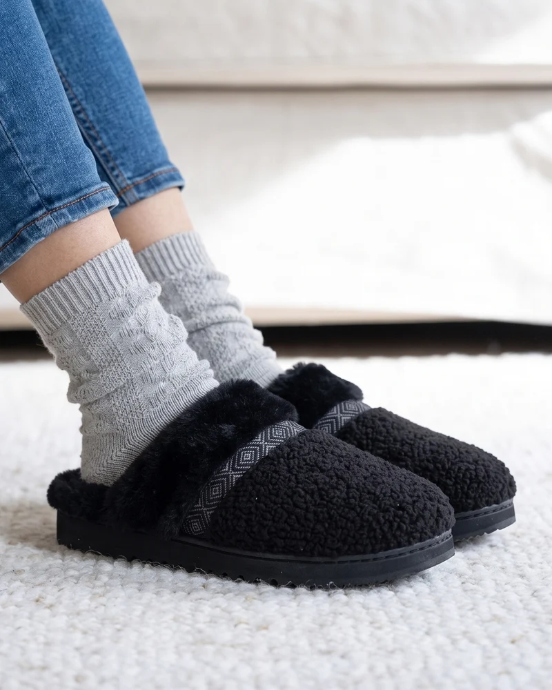 Chaussons Mules crantées Femme Noir