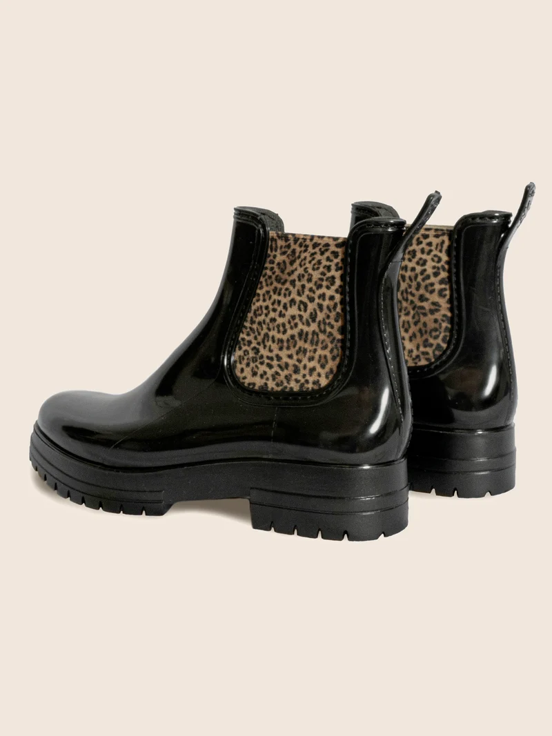 Bottines de pluie crantées noir léopard