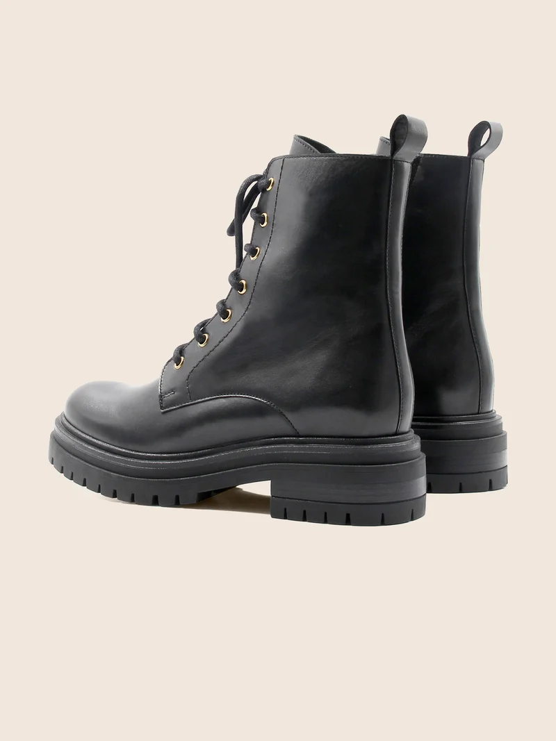 Bottines ranger crantées cuir noir