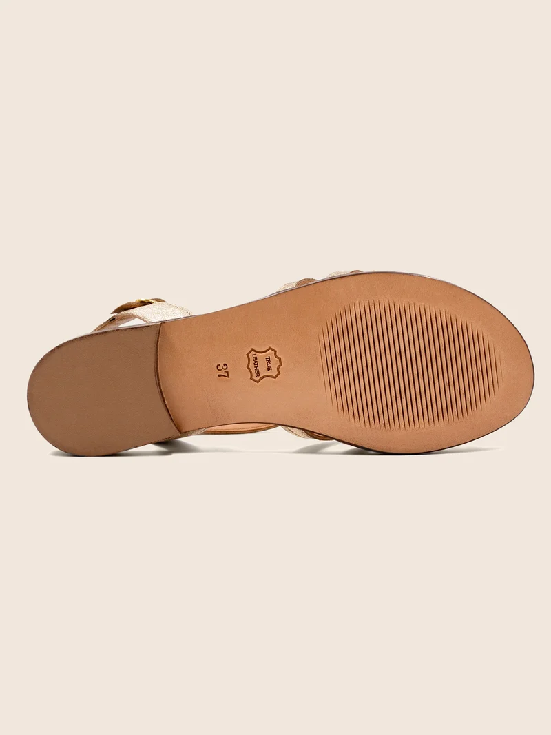 Sandales plates brides cuir doré