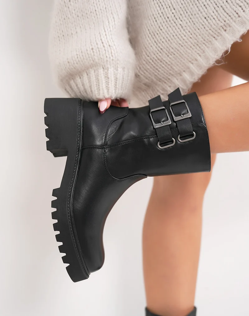 Bottines noires hautes à doubles sangles et semelle crantée