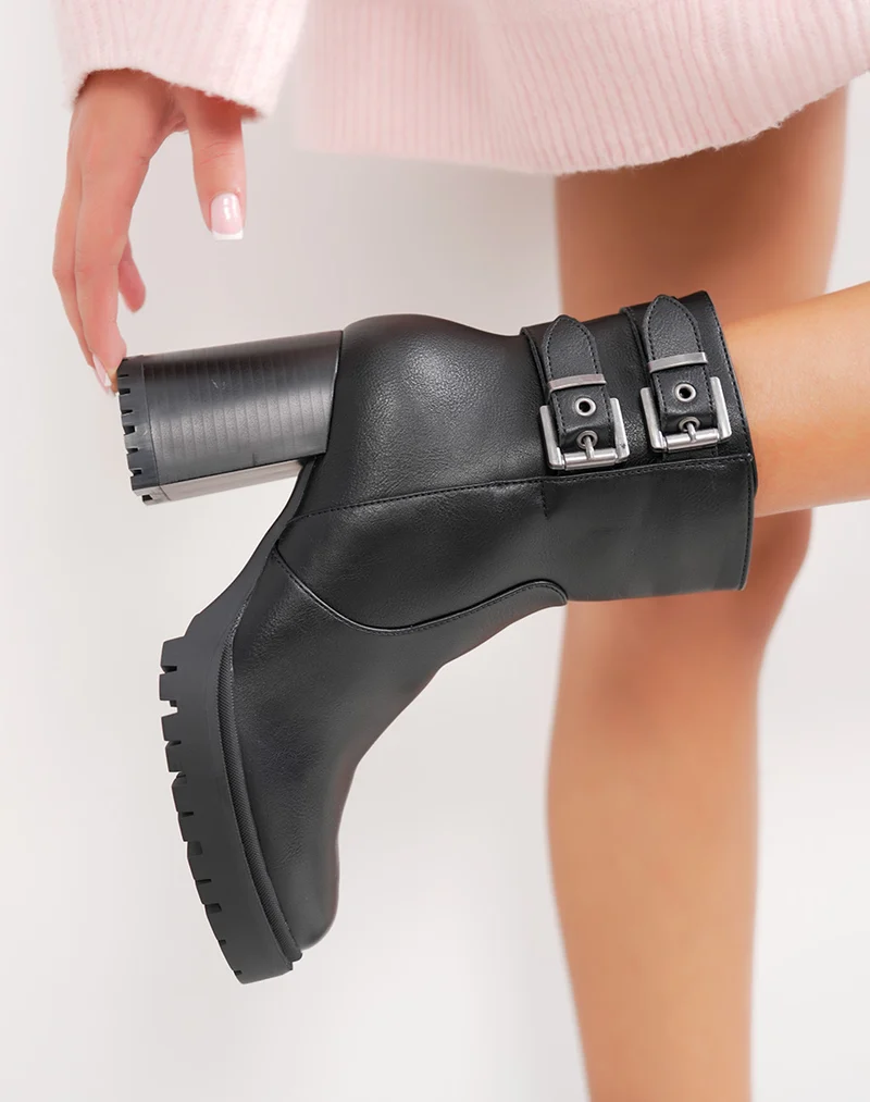 Bottines femme noires à double boucles semelle crantée et intérieur fourré