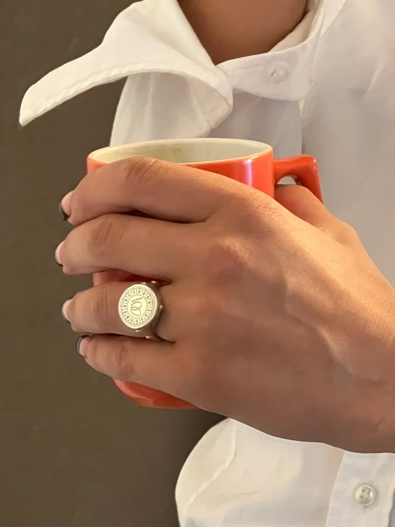 ‘100’ SIGNET SILVER RING