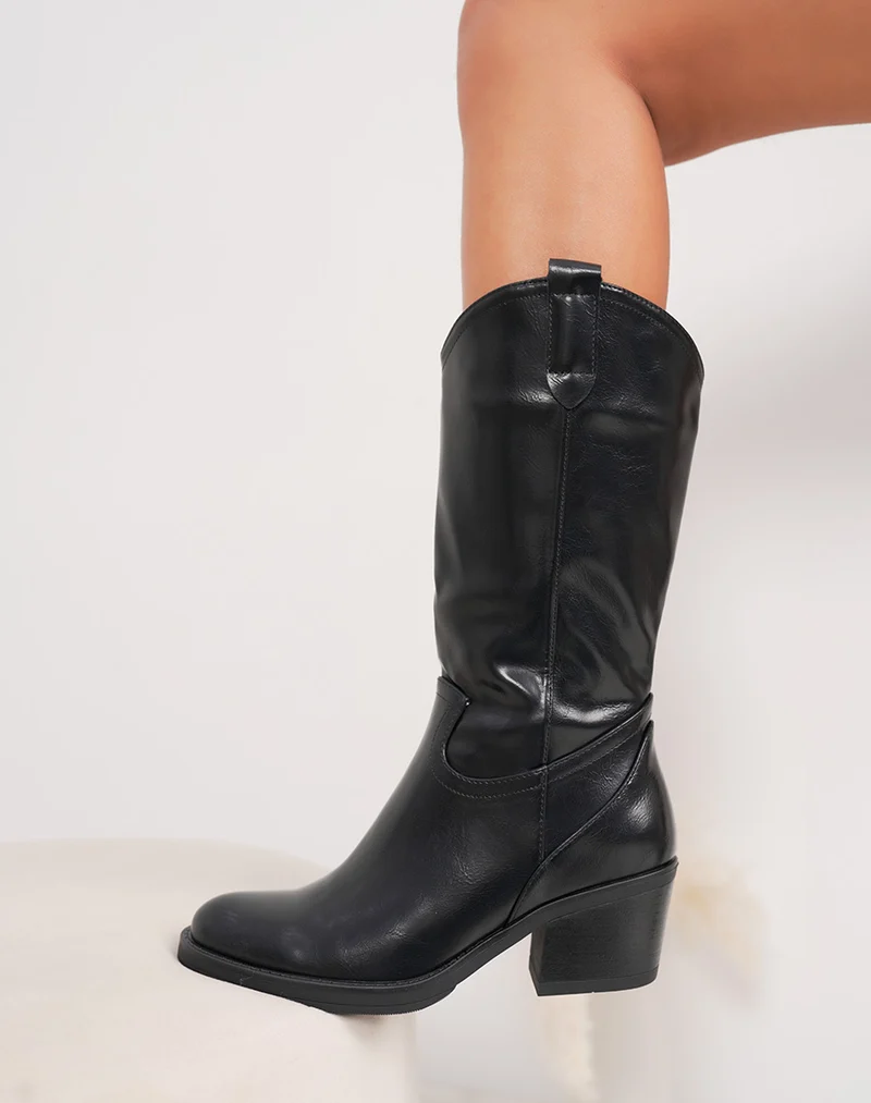 Bottines femme noires hautes tendance style santiags à talon biseauté