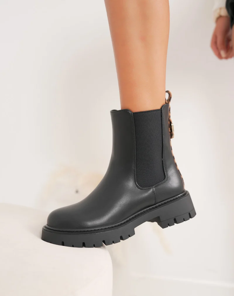Bottines femme noires style Chelsea avec détail léopard et semelle crantée