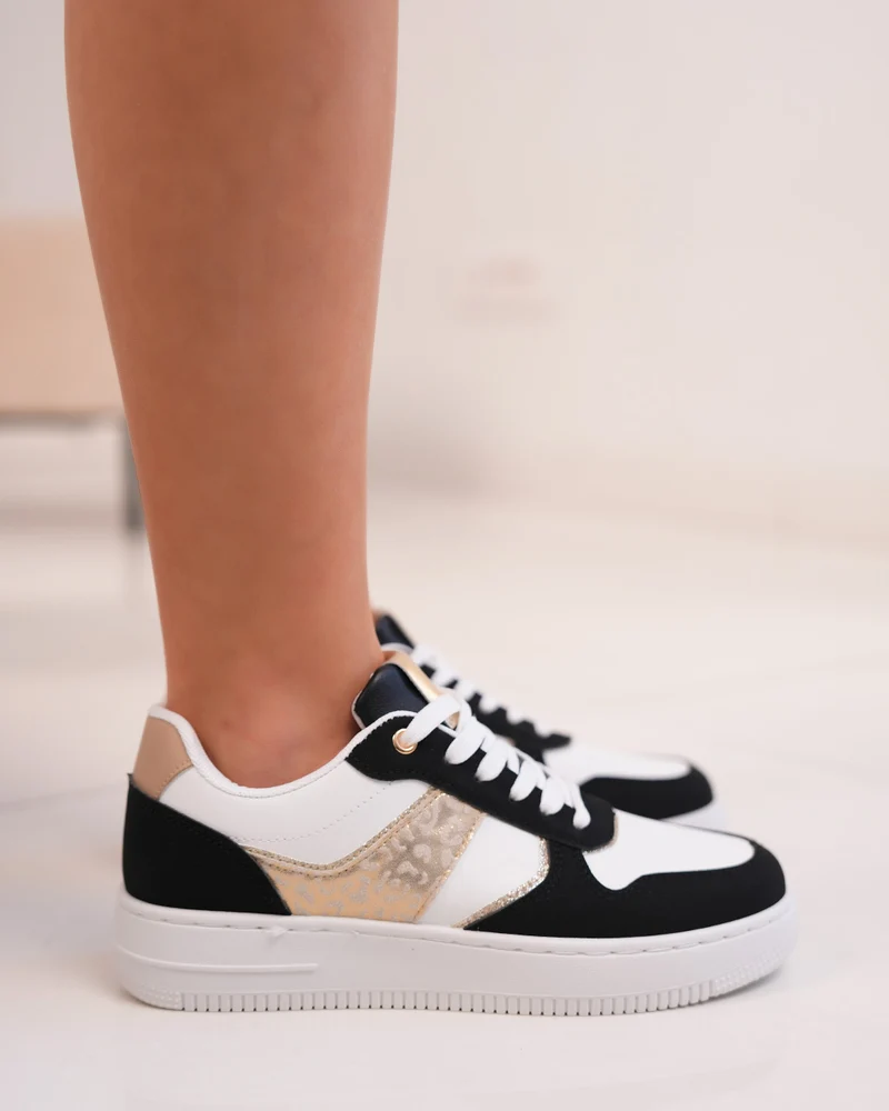Basket femme blanche et noire tendance avec détail léopard doré