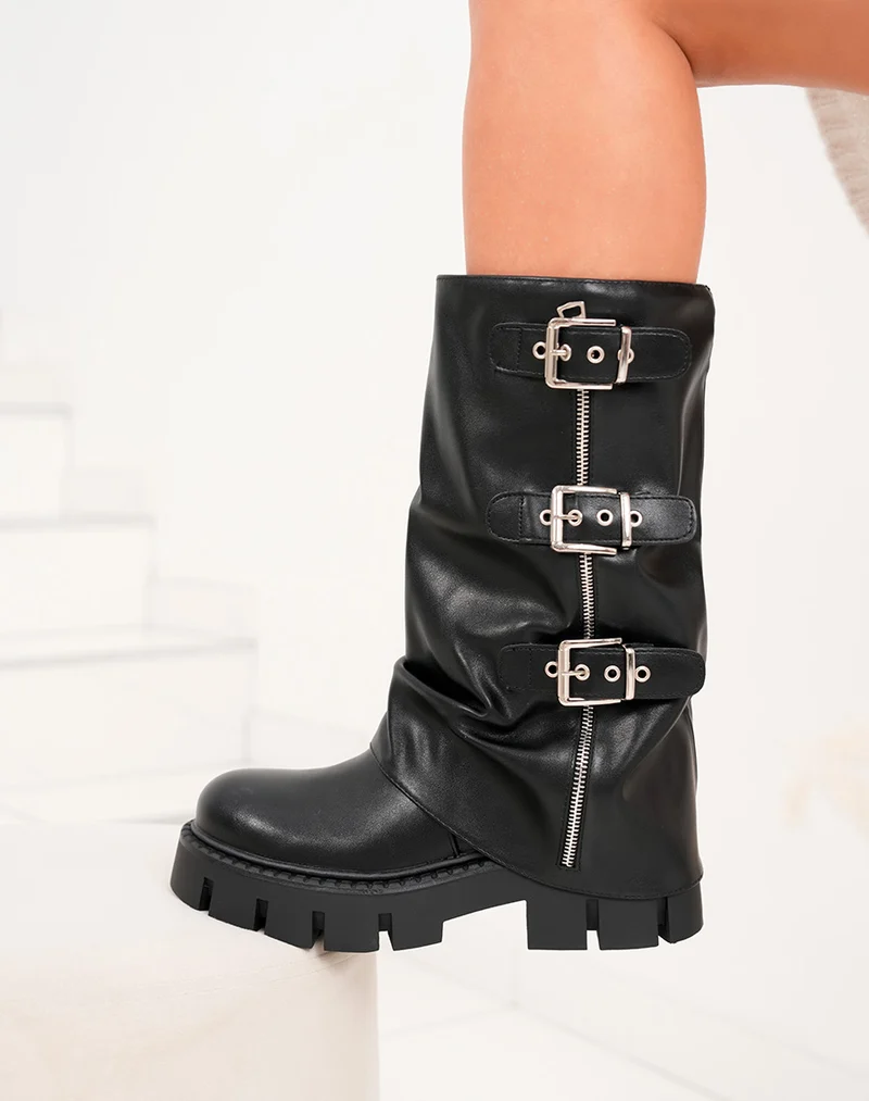 Bottes noires femme à revers avec plateforme crantée et détails boucles