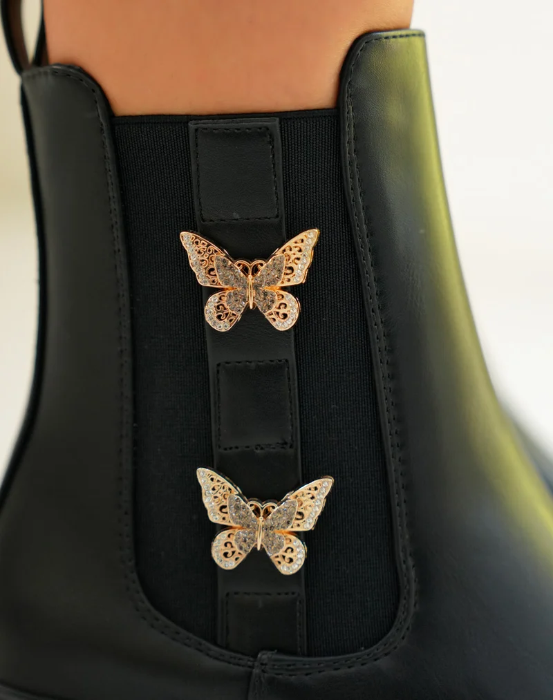 Bottines femme noires avec papillons dorés et semelle crantée