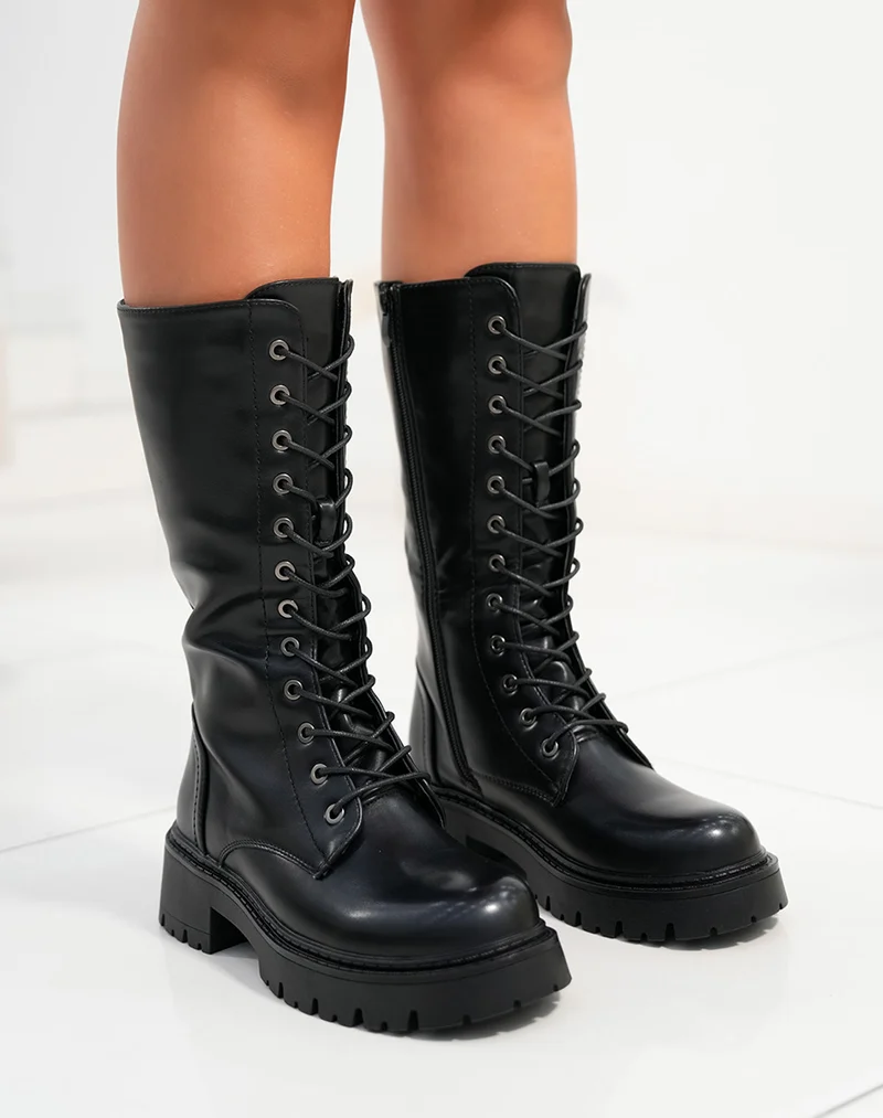 Bottes femme noires à lacets avec semelle épaisse crantée et intérieur fourré