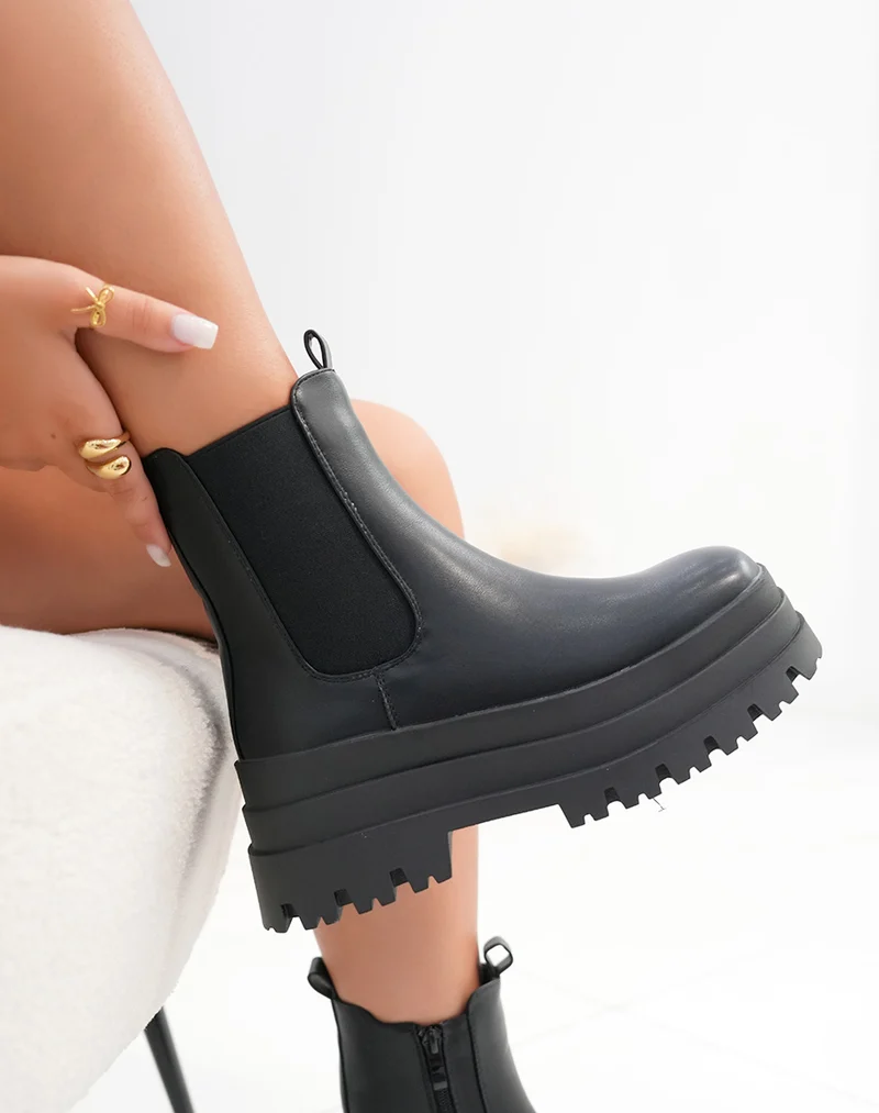 Bottines femme noires style Chelsea avec triple plateforme et semelle crantée