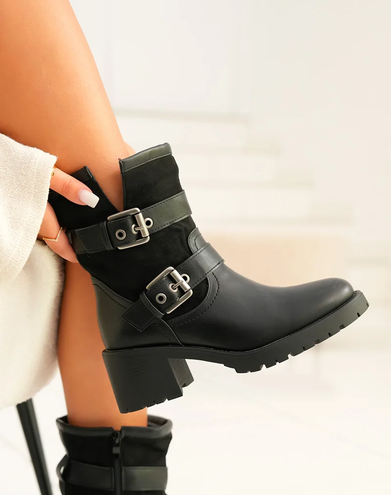 Bottines femme noires avec sangles et détails argentés semelle crantée
