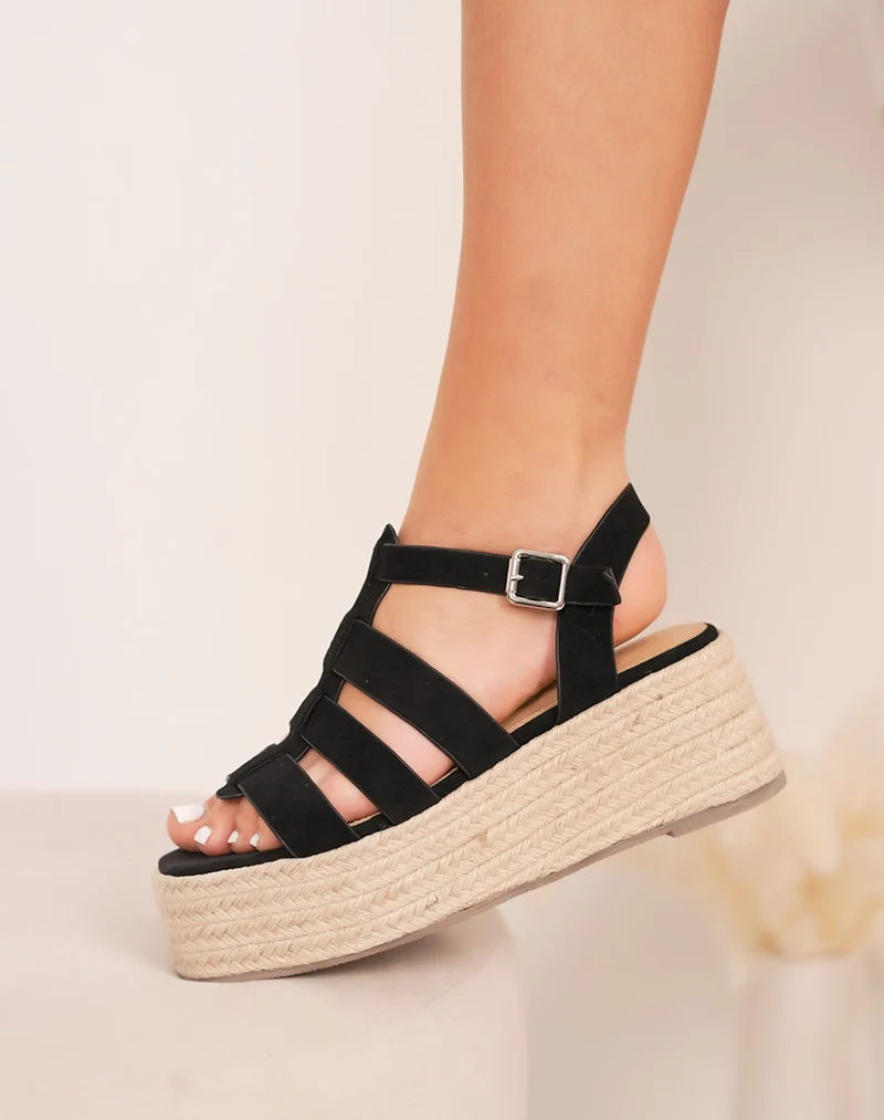 Sandales compensées femme noires en suédine avec multiples brides et semelle effet corde