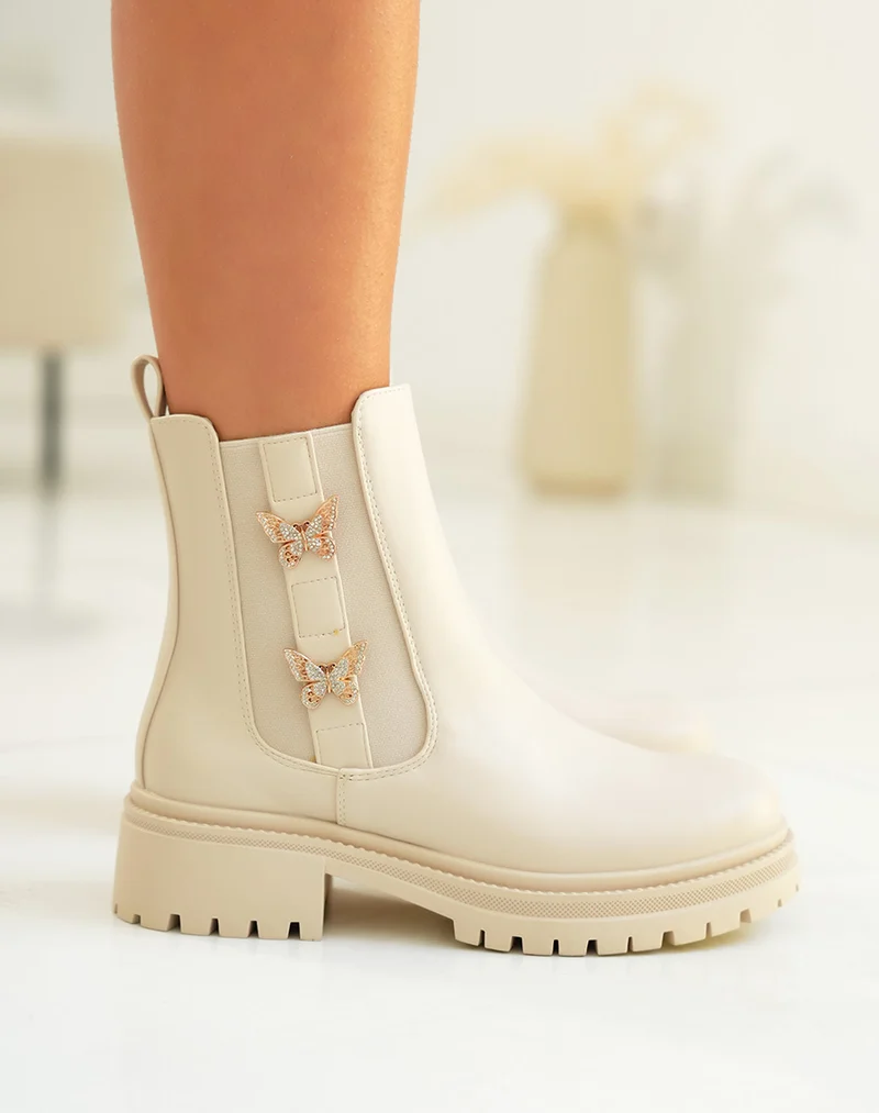 Bottines femme beige style Chelsea avec papillons dorés et semelle crantée