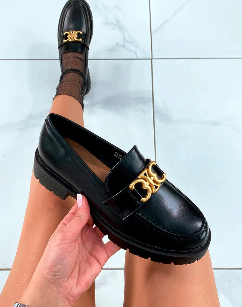 Mocassins noirs à plateforme et à détail doré