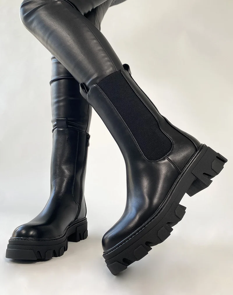 Chelsea boots noires montantes à semelle crantée
