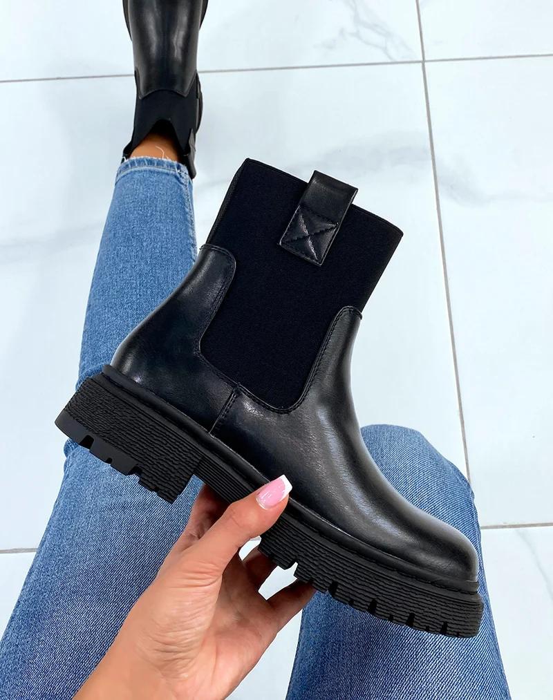 Bottines style chelsea noires à élastique montant