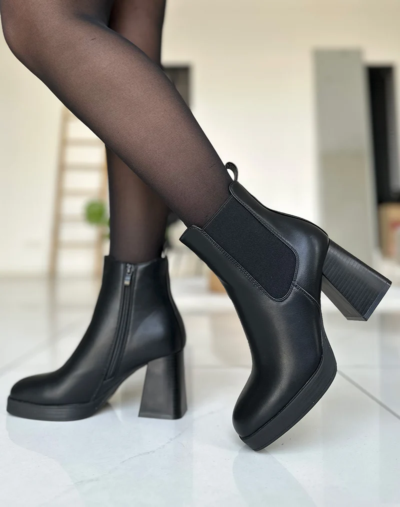 Bottines noires à talon et côté à élastique