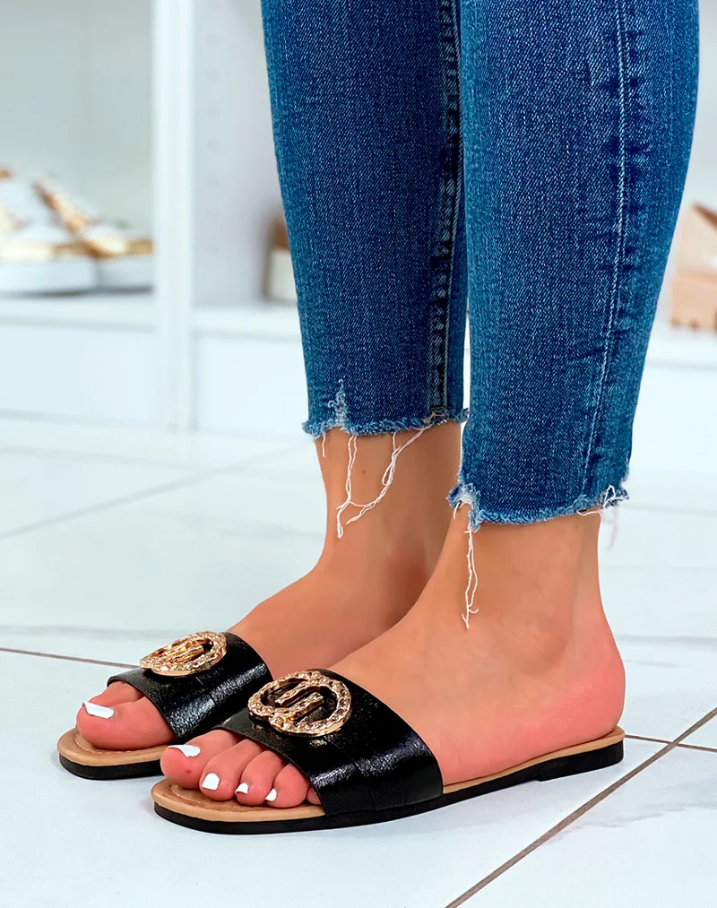 Mules plates noires à double boucle dorée