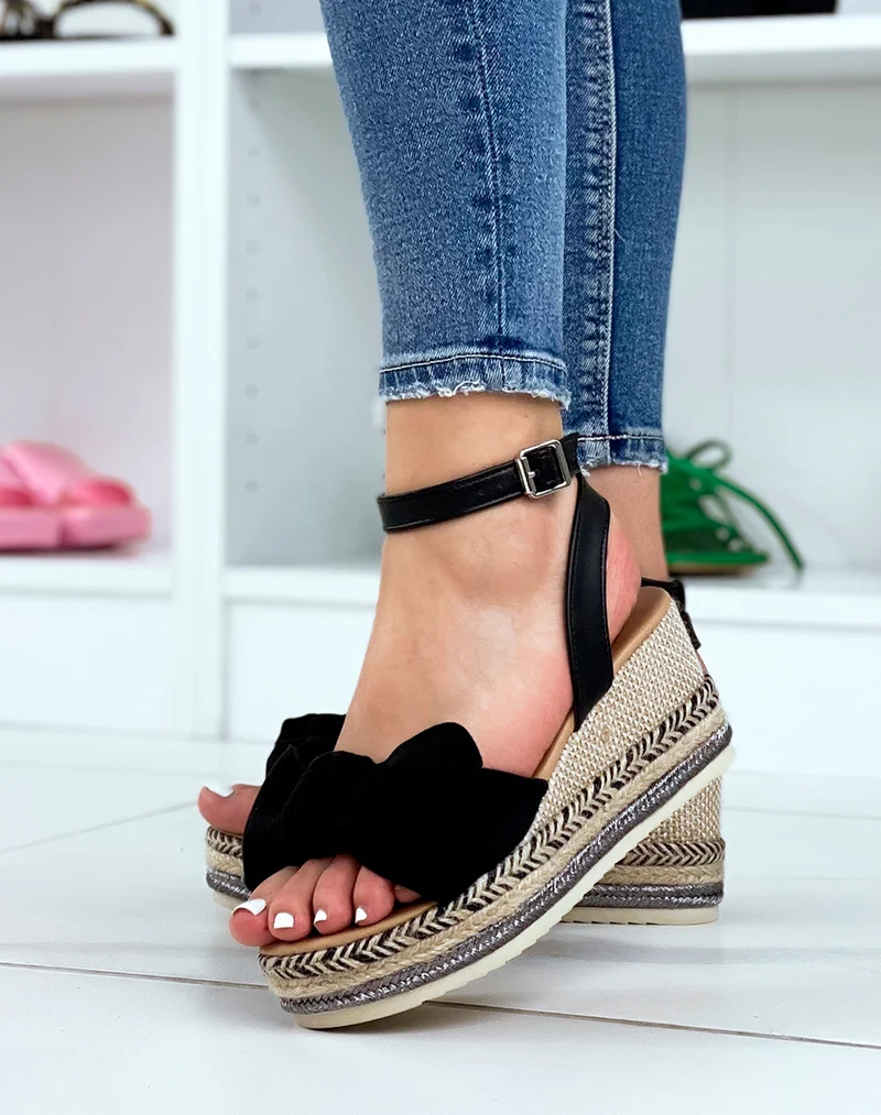 Sandales compensées à noeud en suédine noire et talon en toile de jute coloré