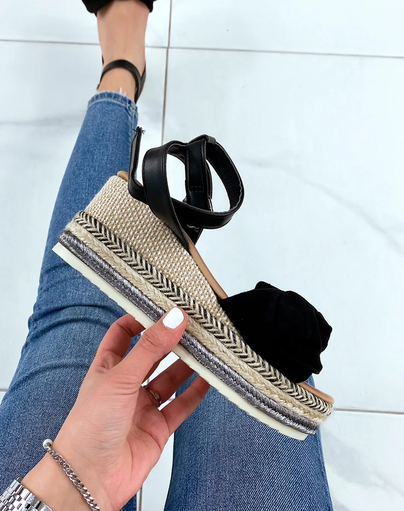 Sandales compensées à noeud en suédine noire et talon en toile de jute coloré