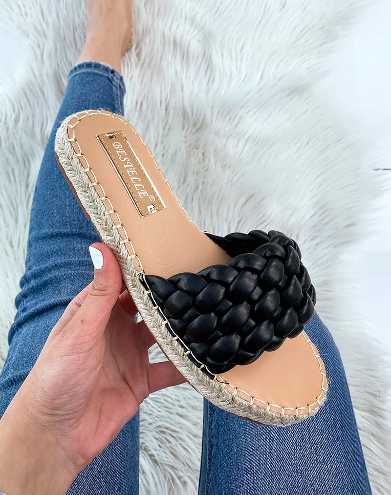 Mules noires tressées à semelle en jute