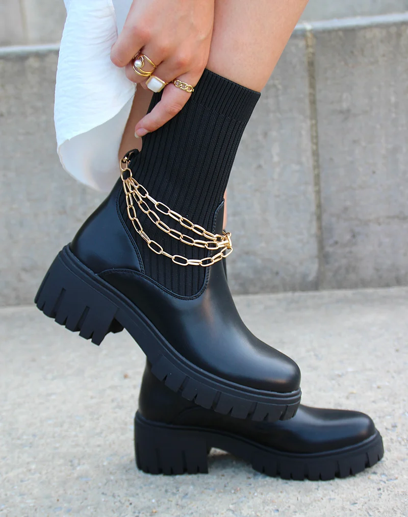 Bottines noires montantes effet chaussette à fines chaines dorées