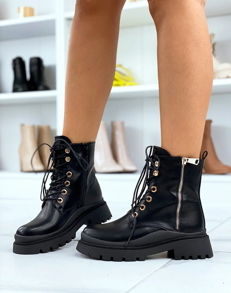 Bottines noires à semelle crantée à détail doré