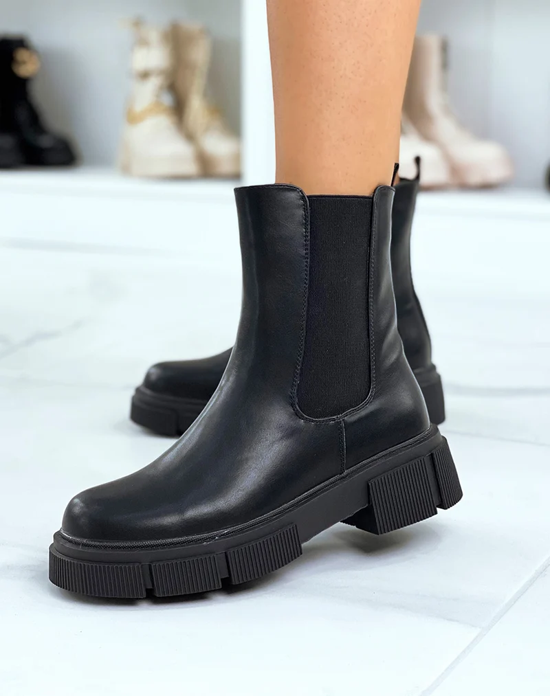 Chelsea boots noires montantes à semelle crantée
