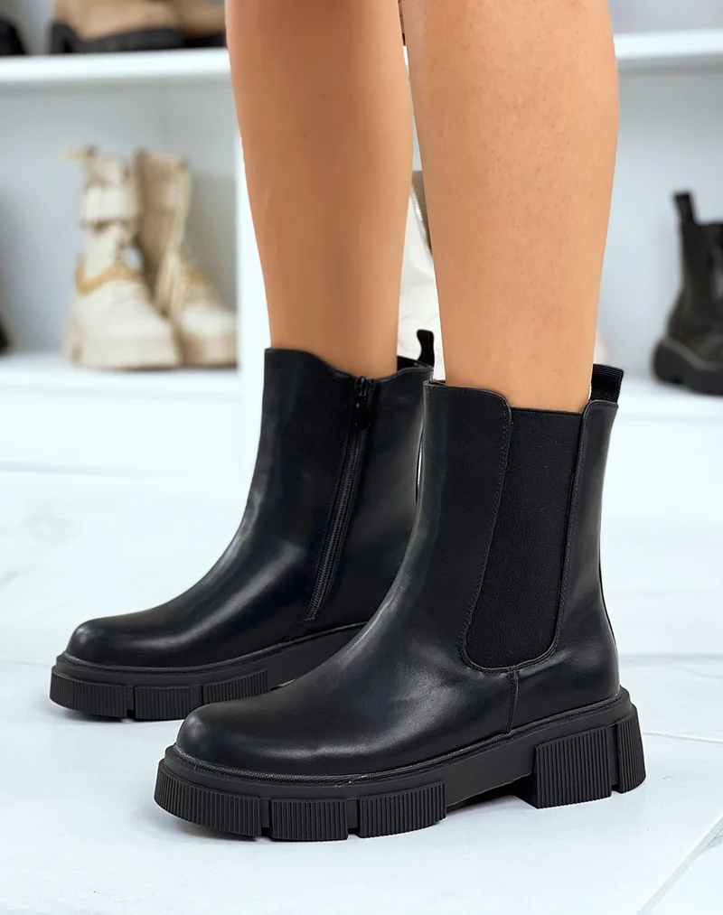 Chelsea boots noires montantes à semelle crantée