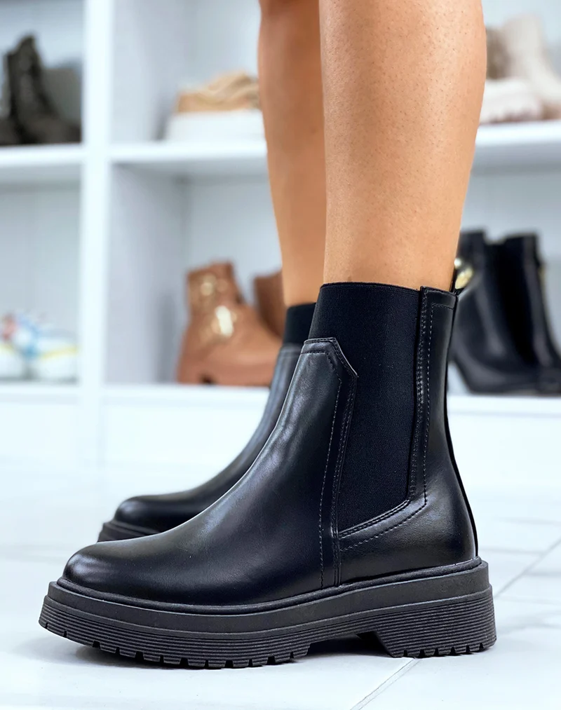 Bottines noires à empiècements et élastiques