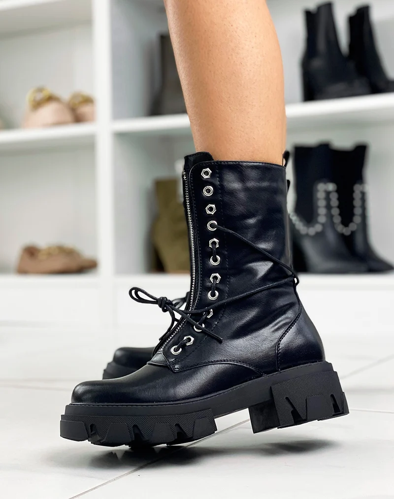 Bottines hautes noires à zip argentée