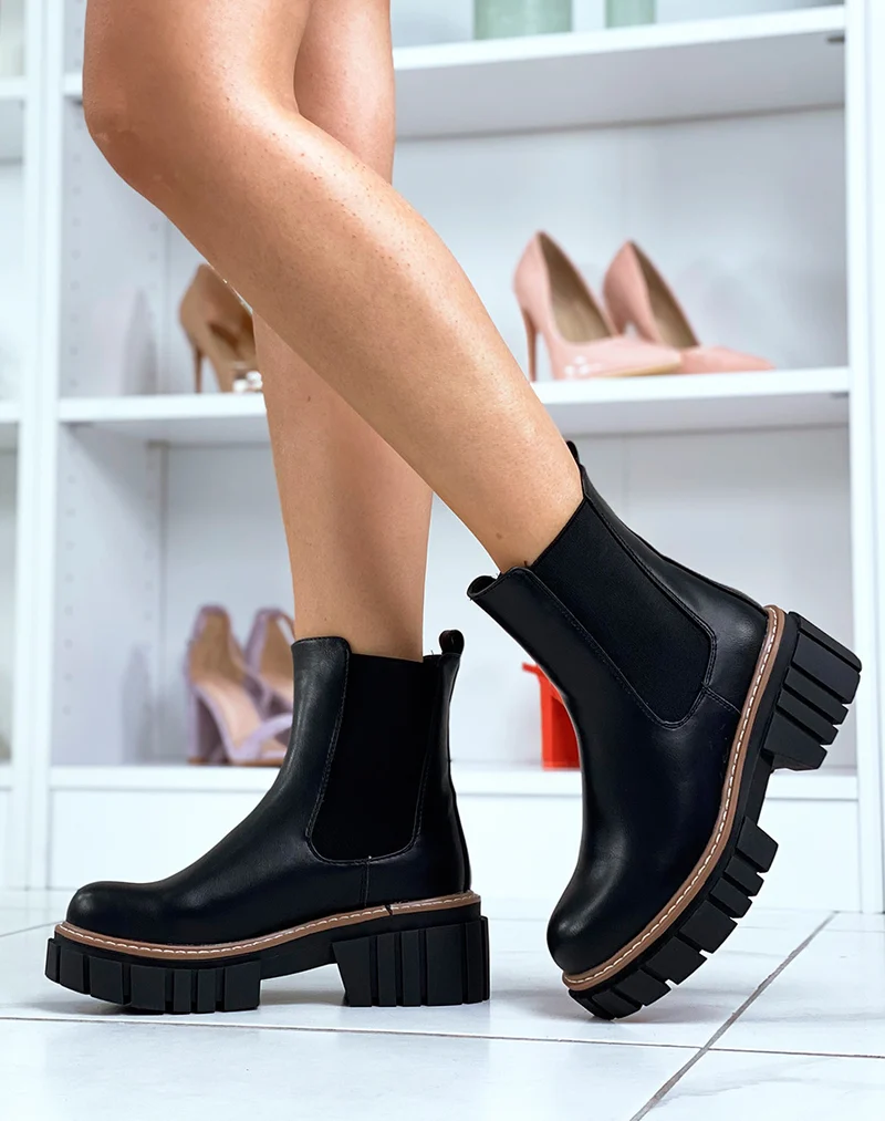 Chelsea boots noires à semelle décorée d’un liseré marron