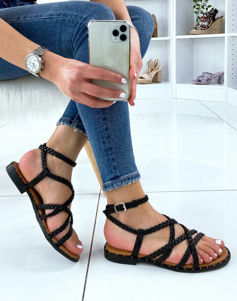 Nu-pieds noirs avec multiples brides tressées