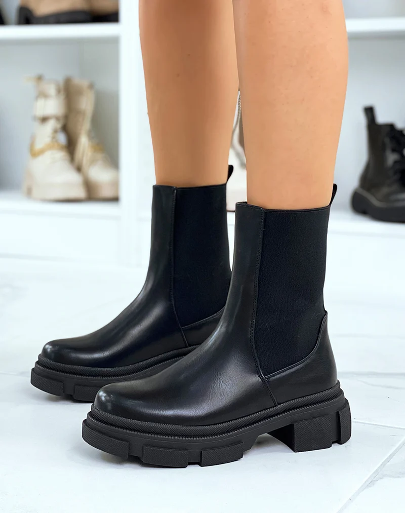 Bottines noires montantes à élastiques et semelle crantée