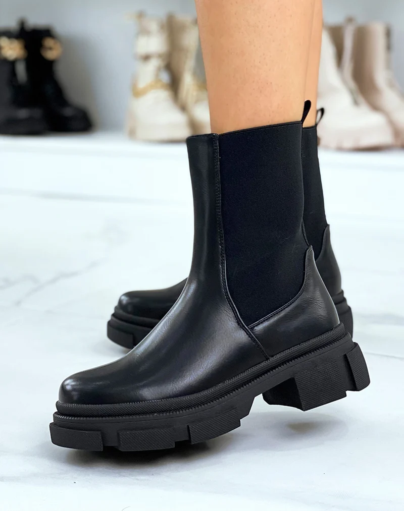 Bottines noires montantes à élastiques et semelle crantée