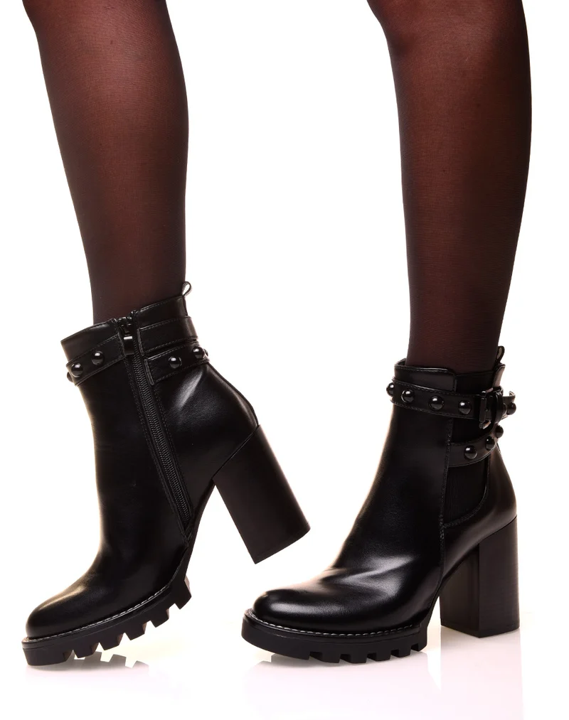 Bottines noires à talon haut à lanière clouté