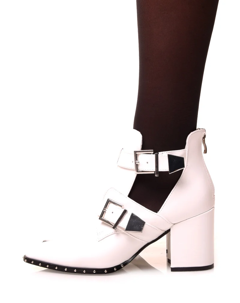 Bottines blanches à talons ajourées de sangles