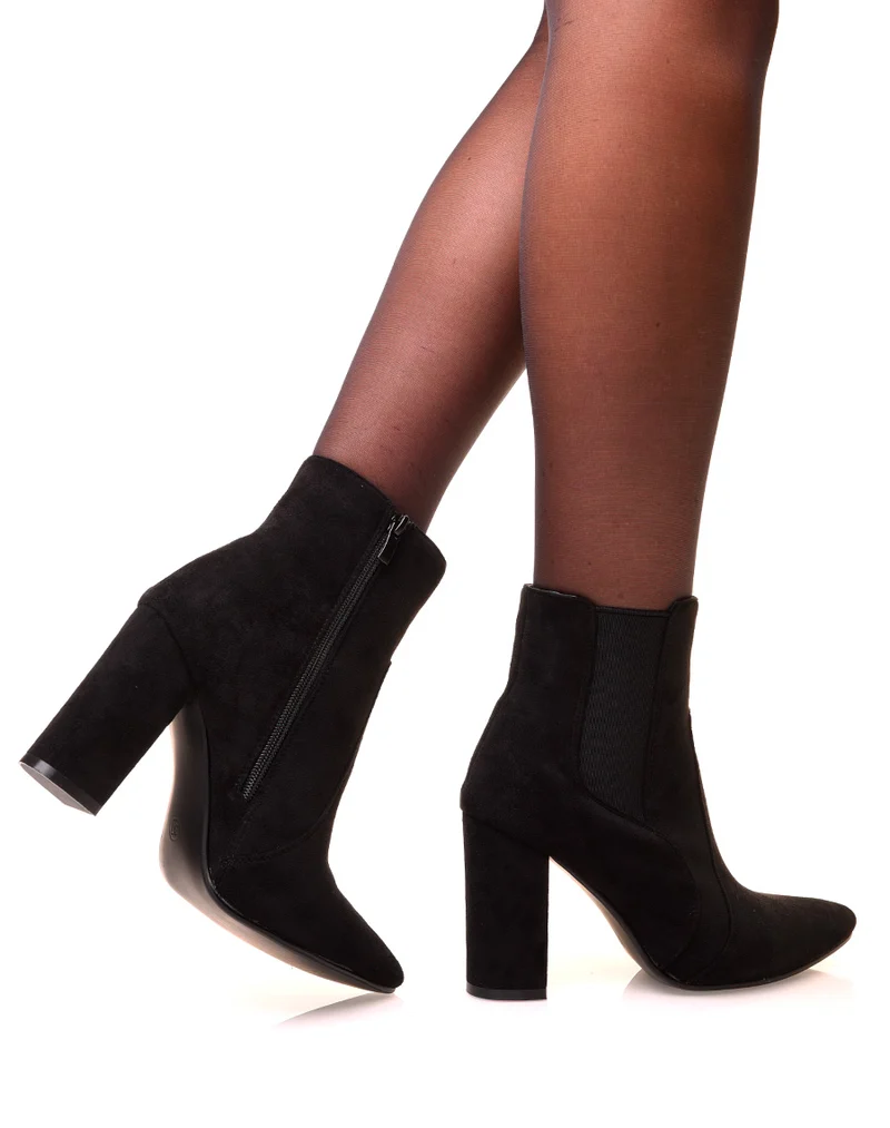 Bottines noires en suédine à talons et bouts pointus