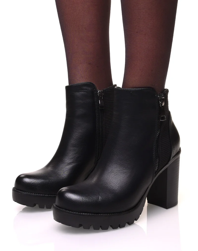 Bottines à talons et plateformes crantées noires bi-matières