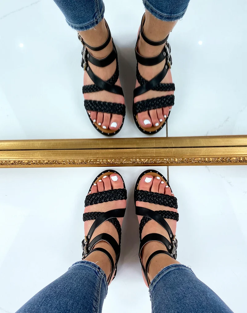 Nu-pieds noirs à multiples brides tressées et lisses