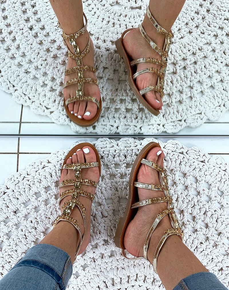 Nu-pieds montantes dorées à bijoux fantaisistes