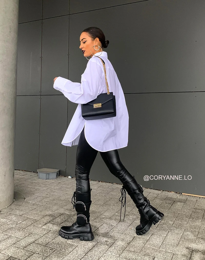 Bottes hautes noires à lacets et à poches