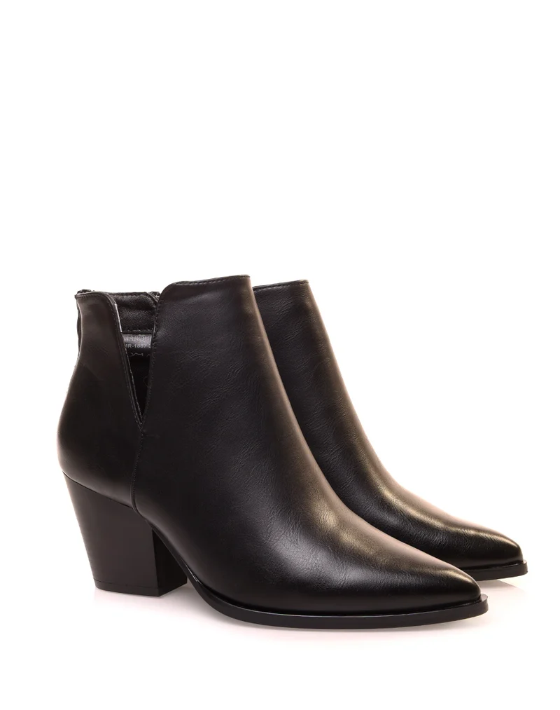 Bottines noires à talon biseauté et ajourées