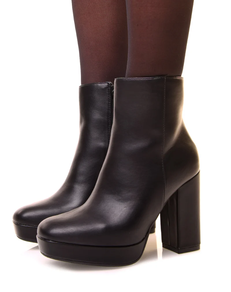 Bottines noires à talon et à grosse plateforme