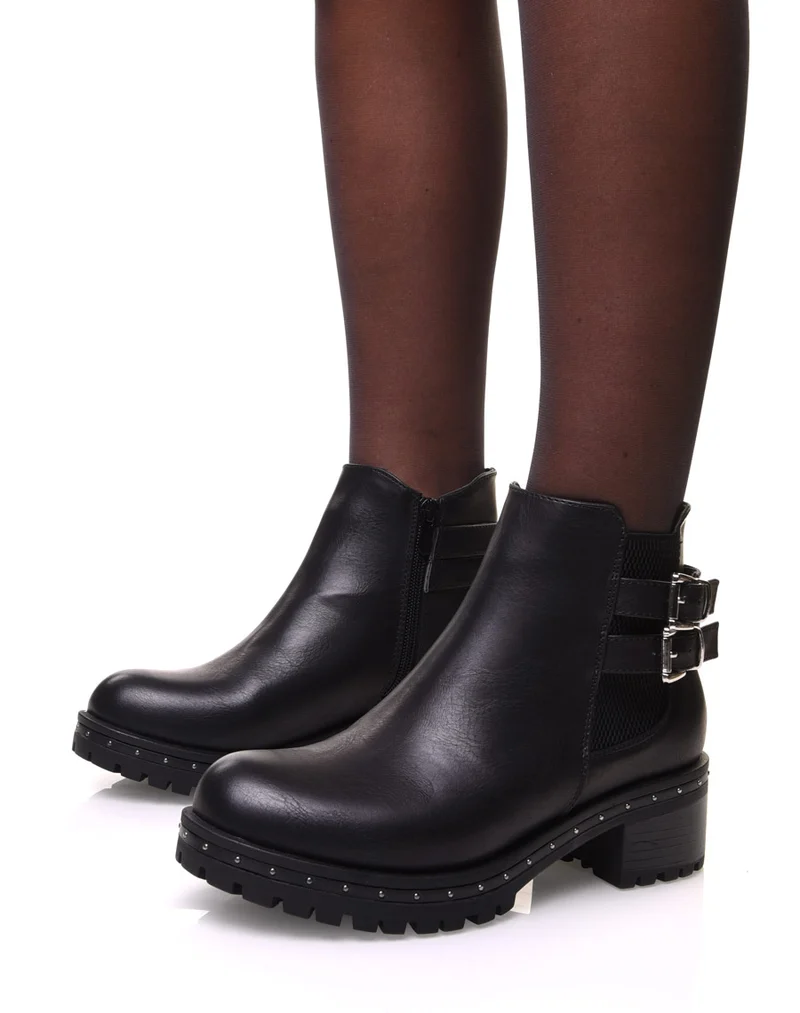 Bottines noires à semelle crantée et cloutée