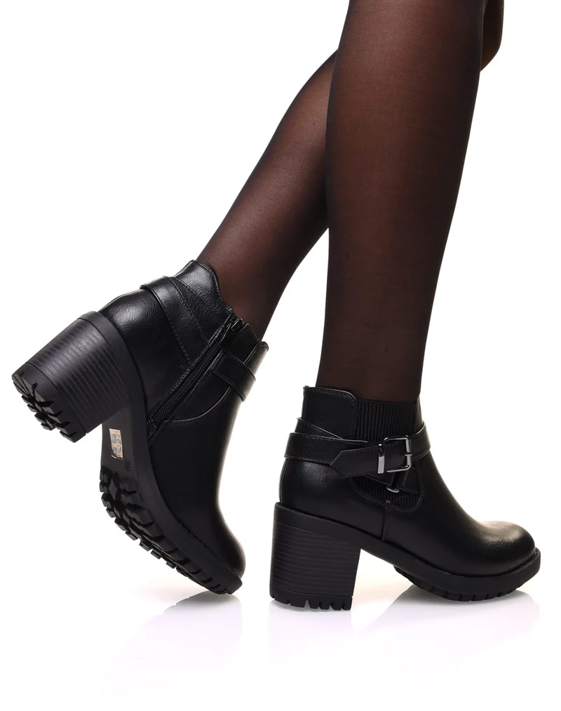 Bottines noires grainées à talon élastique rayé et sangles