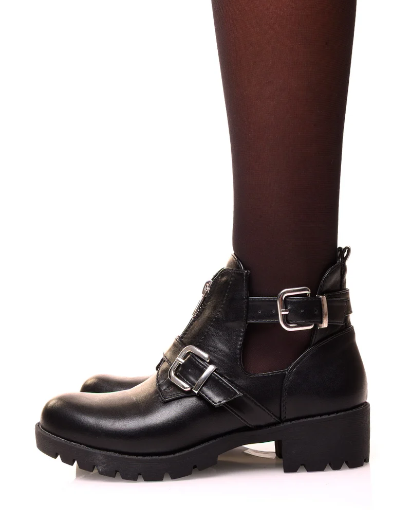Bottines noires ajourées de sangles et d’un zip