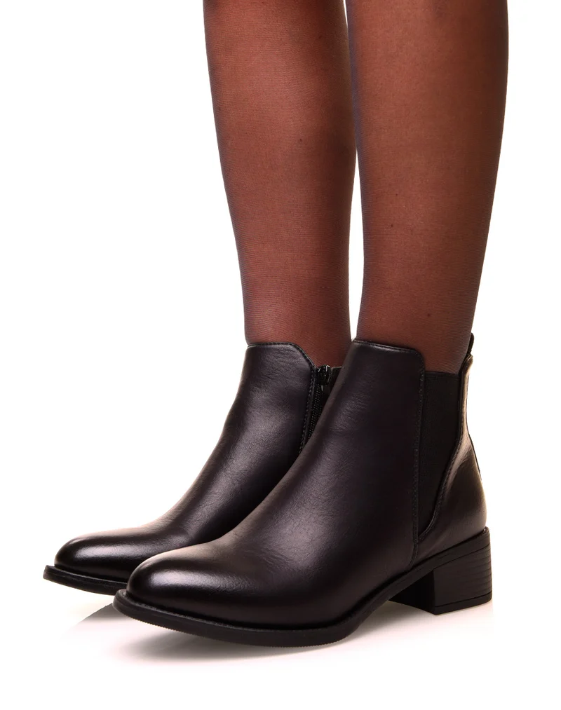 Bottines noires bi-matières à semelles crantées