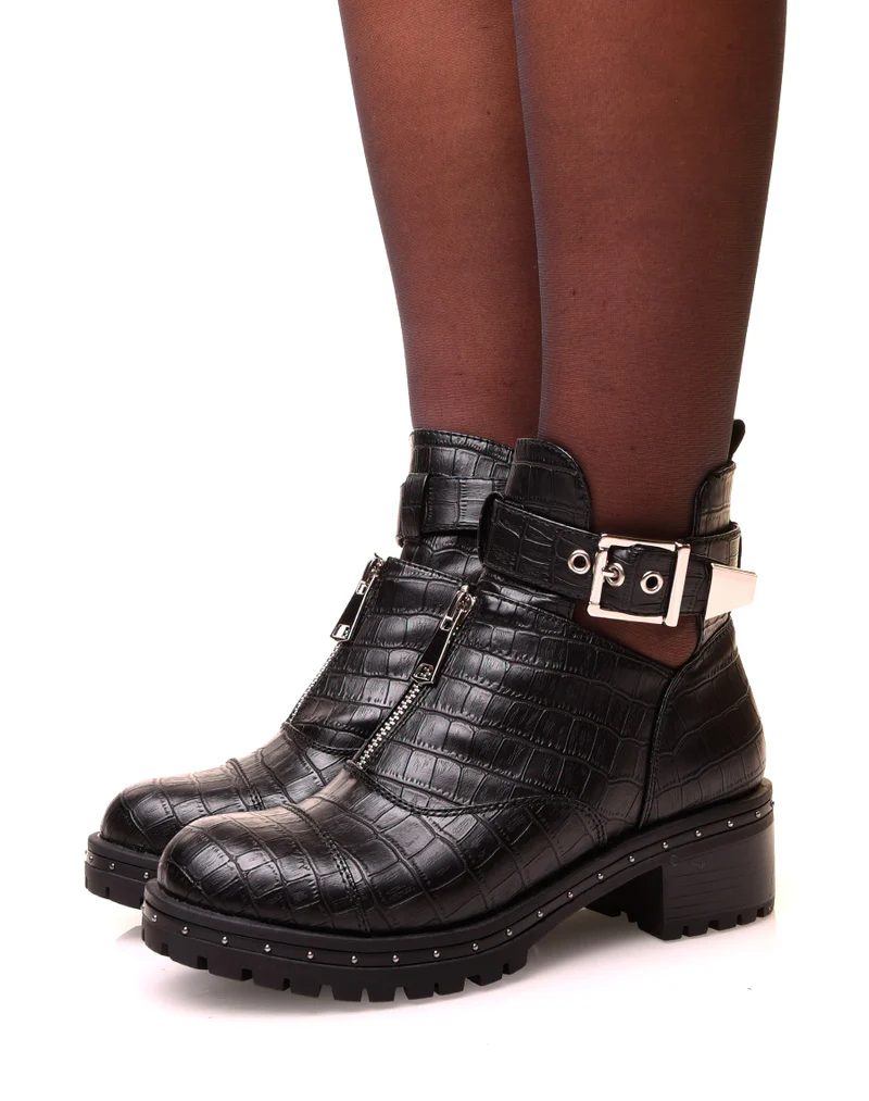 Bottines noires effet croco ajourées à sangle