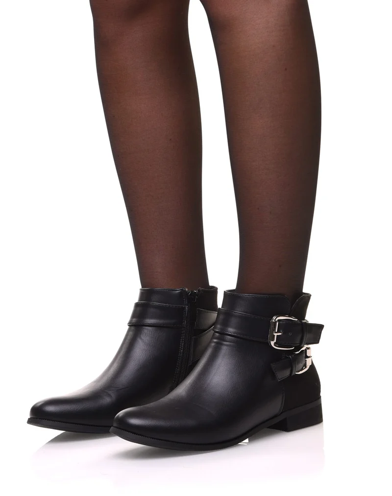 Bottines noires plates lanières à sangles décoratives
